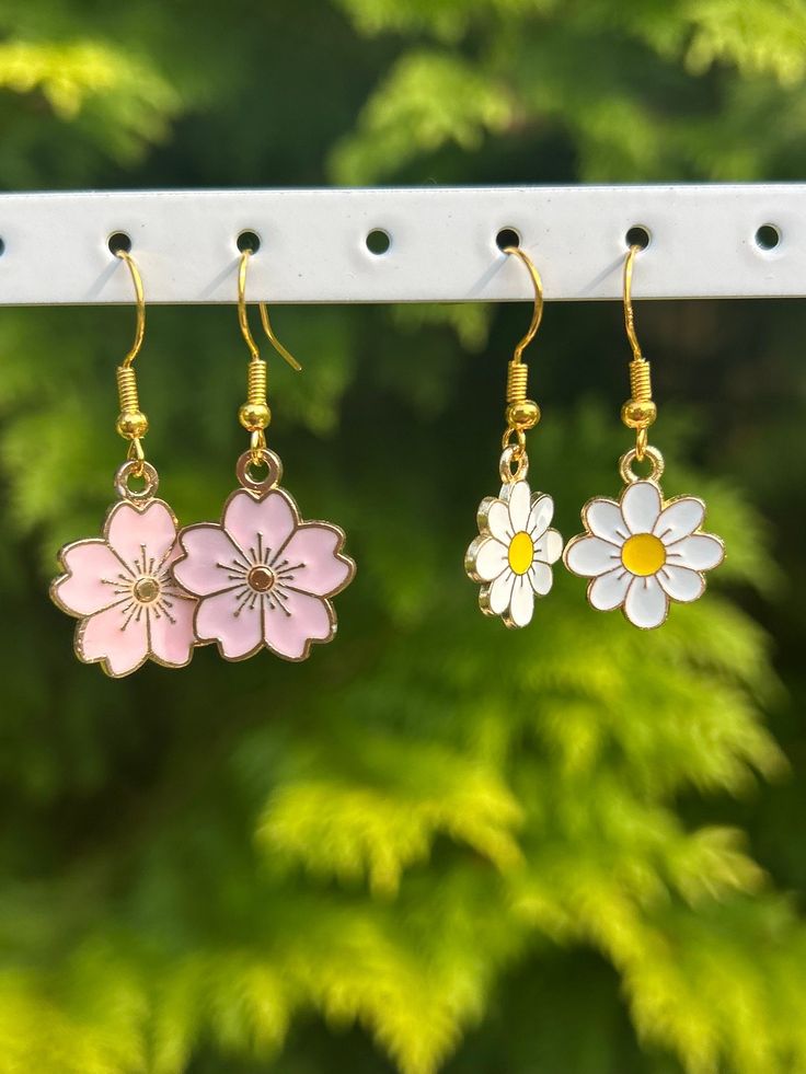 Pretty flower earrings for any occasion! Perfect for gifts 🌸 Dainty Dangle Flower Earrings For Gift, Mother's Day Dangle Earrings With Flower Charm, Spring Birth Flower Jewelry, Blossom Flower Earrings For Pierced Ears, Blossom Color Flower Earrings For Pierced Ears, Cute Rose Gold Flower Jewelry, Blossom Color Flower Earrings, Pink Birth Flower Jewelry In Flower Shape, Mother's Day Gift Dangle Flower Earrings