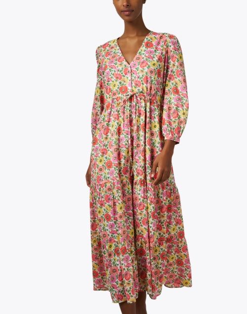 Banjanan's Castor dress perfectly channels the brand's feminine take on artistic prints. Perfect for the transitional season ahead, it features an all-over floral motif, balloon sleeves, cinch tie waist, and tiered maxi hem. Style yours with sandals and a coordinating clutch for a fun daytime look. Multicolor Tiered Dress For Spring Garden Party, Spring Floral Maxi Dress For Daywear, Floral Print Maxi Dress For Daywear, Flowy Floral Print Tiered Dress For Spring, Tiered Multicolor Floral Print Maxi Dress, Spring Floral Print Maxi Dress For Daywear, Multicolor Flowy Tiered Dress For Spring, Flowy Multicolor Tiered Dress For Spring, Spring Flowy Tiered Dress For Daywear