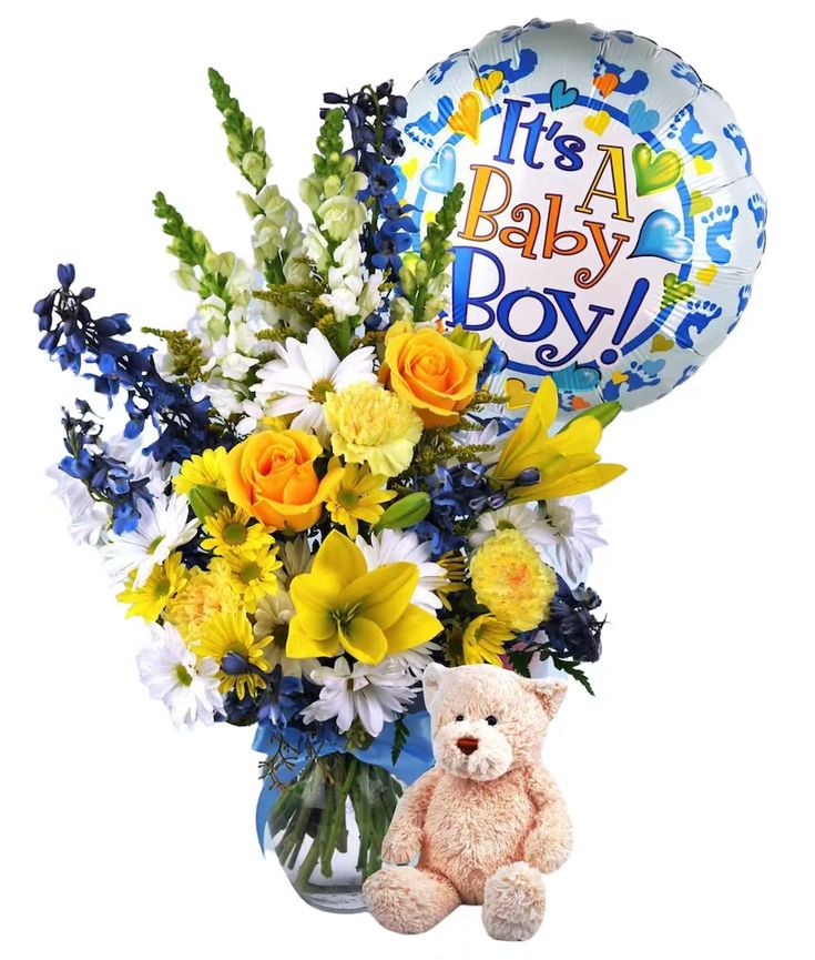 a teddy bear sitting next to a vase filled with flowers and a balloon that says it's a baby boy