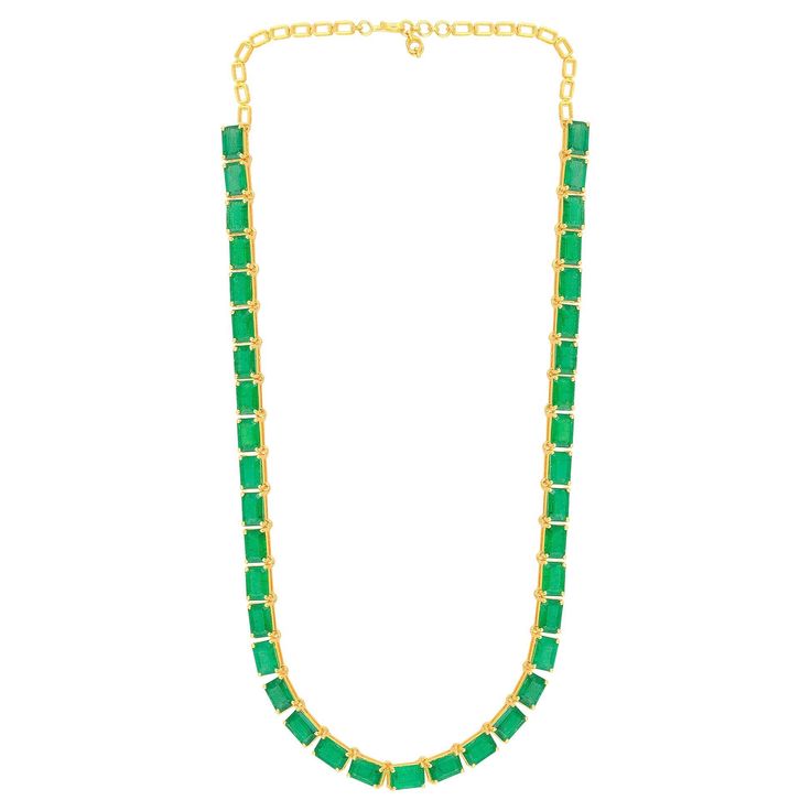 Crafted with meticulous attention to detail, this necklace showcases exquisite craftsmanship and a commitment to excellence. The 14k yellow gold setting provides a warm and luxurious backdrop for the emeralds, enhancing their color and creating a harmonious composition. The choker length adds a modern and trendy touch, gracefully adorning the neckline. Item Code :- SEN-5124 (14k) Gross Weight :- 18.52 gm 14k Yellow Gold Weight :- 13.94 gm Emerald Weight :- 22.90 carat Necklace Length :- 16 Inche Green Diamond Necklace For Formal Occasions, Luxury Emerald Gemstone Necklace For Formal Occasions, Formal Green Hallmarked Diamond Necklace, Formal Single Strand Emerald Necklace, Exquisite Yellow Gold Emerald Necklace, Formal 22k Gold Chain Necklace, Gold Gemstone Diamond Necklace For Formal Occasions, Luxury Single Strand Chain Necklace, Gold Diamond Necklace With Gemstone For Formal Occasions