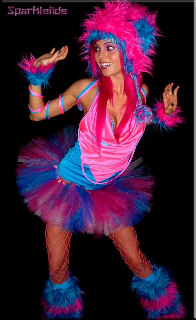 a woman in a pink and blue costume