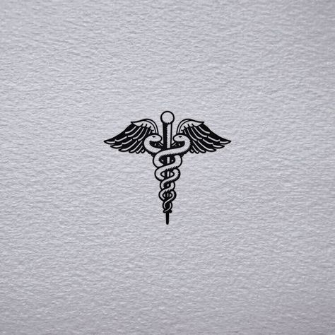 a medical symbol on white paper