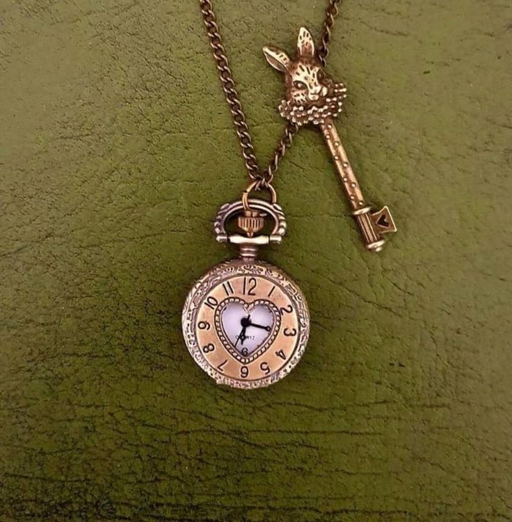 Alice in Wonderland Pocketwatch Necklace with White Rabbit Key Bronze coloured Brand new with working battery Chain length is 80cm but I can adjust it to a smaller size upon request. Clock is 2.5cm x 2.5cm Mad Hatter Jewelry, Alice In Wonderland Necklace, Rabbit Necklace, Alice In Wonderland Jewelry, Alice In Wonderland Aesthetic Outfit, Clock Necklace, Batman Outfits, Lizzie Hearts, Rabbit Necklaces