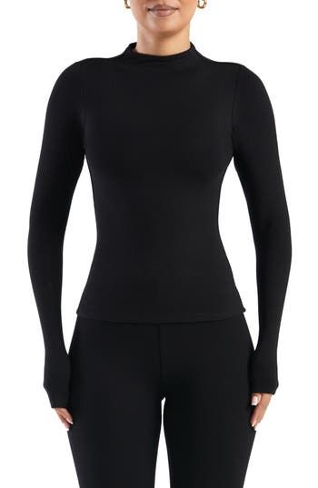 Buttery-soft fabric lends an indulgent feel to this stretchy, long-sleeve top crowned with a mock neck. 21 1/2" length (size Medium) Mock neck Long sleeves Partially lined 87% rayon, 13% spandex Hand wash, line dry Made in the USA Naked Wardrobe, Mock Neck Top, Mock Neck, Soft Fabric, Soft Fabrics, Long Sleeve Tops, Made In The Usa, Sleeve Top, Top Blouse