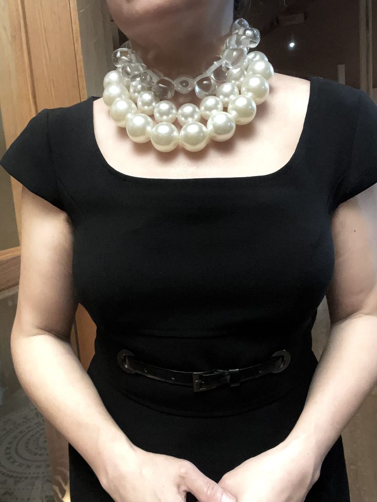 A set of 2 strands of medium-sized simulation pearls, with a separate choker necklace of one clear resin, tooth-shaped clear beads. You can wear the set or wear one or the other. The clear beads necklace contrasts the pearls' formality but also brings out the shine of the beads. The combination of styles is a unique statement for day or night. The necklace includes an extension to elongate both necklaces as a set or only one.

This item sells as a set.
The clear beads choker measures 16 IN/5 OZ.
The double-strand necklace measures 17 IN/ 10 OZ
Extension up to 5 IN
A set 16 IN/15 OZ Trendy Pearl Necklace For Party, Trendy White Pearl Necklace For Party, Trendy Pearl Choker Necklace For Party, Silver Plastic Jewelry For Party, Elegant Plastic Jewelry For Parties, Pearl White Choker With Pearl Chain For Party, Trendy Pearl Chain Choker For Party, Plastic Beaded Jewelry For Party, White Pearl Embellished Choker For Party