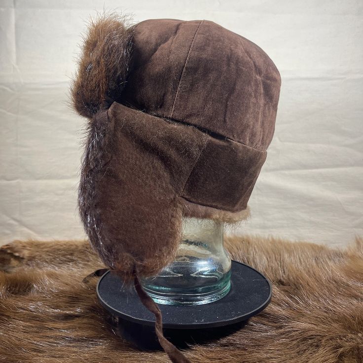 Made With Genuine Beaver Fur, Short Haired And Course Material. Made In Usa Manufactured By Kastoria Furs Winter Windproof Hat With Short Brim, Brown Hats With Ear Flaps For Cold Weather, Brown Short Brim Hat For Cold Weather, Brown Ear Flaps Hat For Cold Weather, Winter Fur Felt Hats For Cold Weather, Vintage Fur Felt Hat For Winter, Vintage Winter Fur Felt Hat, Classic Brown Hat For Cold Weather, Winter Outdoor Fur Felt Hat