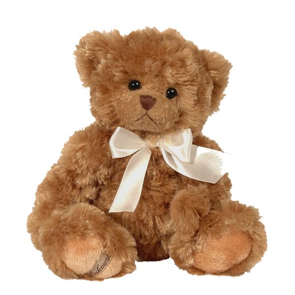 a brown teddy bear with a white bow