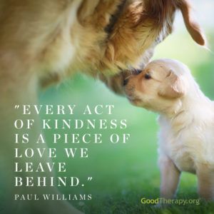 a puppy kissing another puppy's face with a quote from paul williams on it