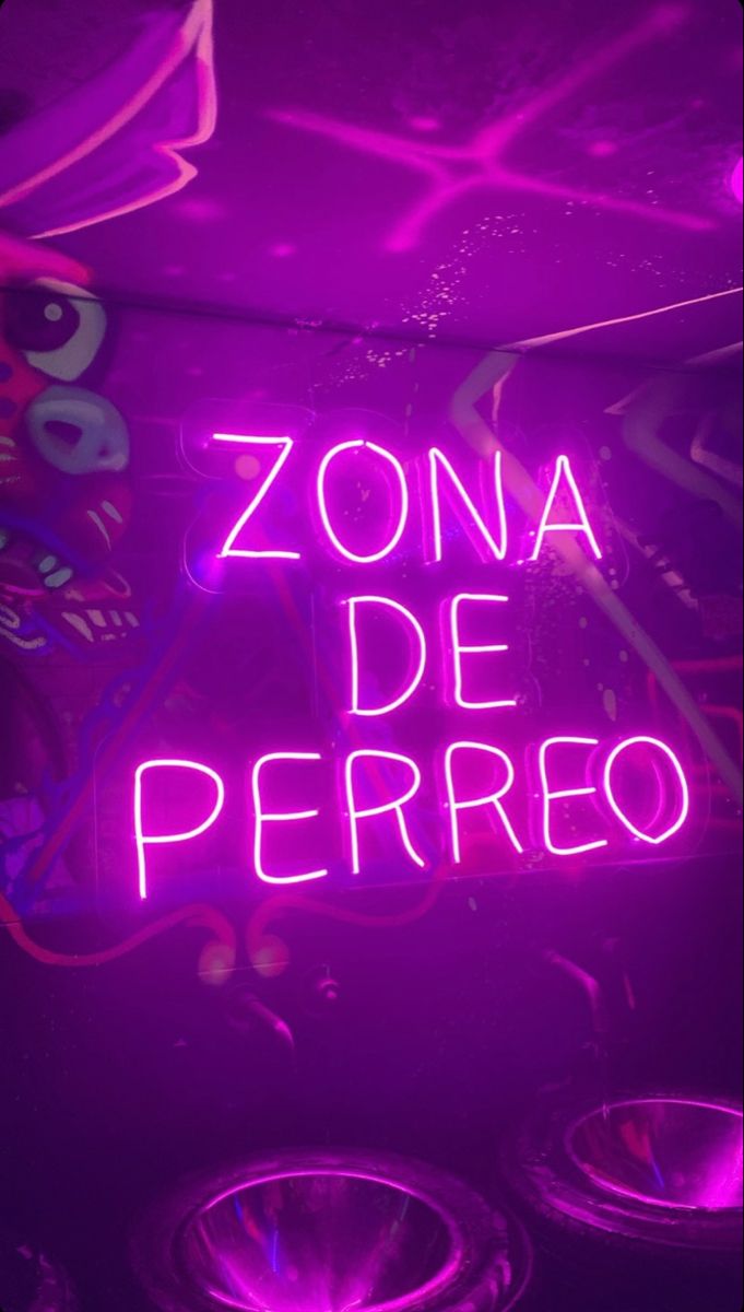 a neon sign that reads zona de perreo