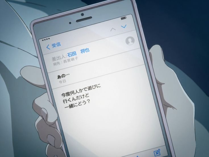 a person holding up a cell phone in front of an anime character's face