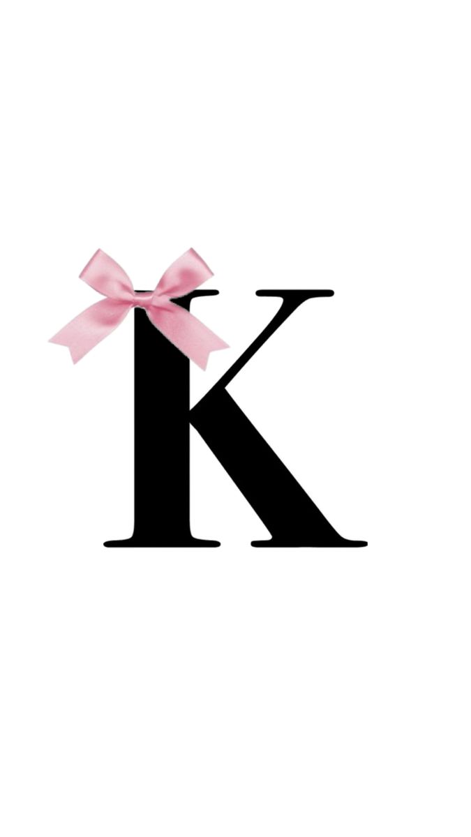 the letter k has a pink bow on it