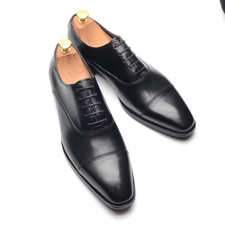 Crafted from cow leather, these slip-on dress shoes offer a smooth finish and easy wear, lined with comfortable pigskin, perfect for formal or business wear. Classic Leather Slip-on Shoes For Office, Business Leather Slip-on Shoes With Rubber Sole, Fitted Slip-on Oxfords For Formal Occasions, Wingtip Dress Shoes With Brogue Detailing For Business Meetings, Slip-on Leather Oxfords For Business, Elegant Slip-on Dress Shoes For Business, Elegant Slip-on Oxfords For Formal Occasions, Wingtip Leather Shoes With Brogue Detailing For Business, Plain Toe Oxfords With Leather Lining For Semi-formal