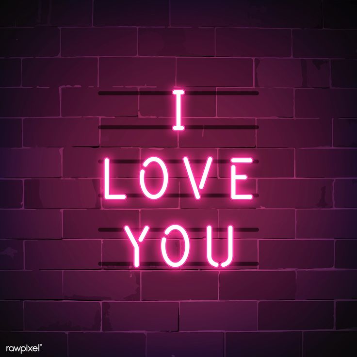 i love you neon sign against a brick wall