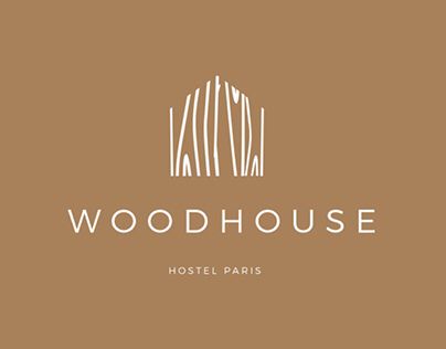 the logo for woodhouse hotel paris