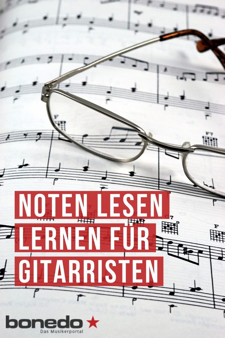 glasses on top of sheet music with the words noten lessen learn fur gitarsten