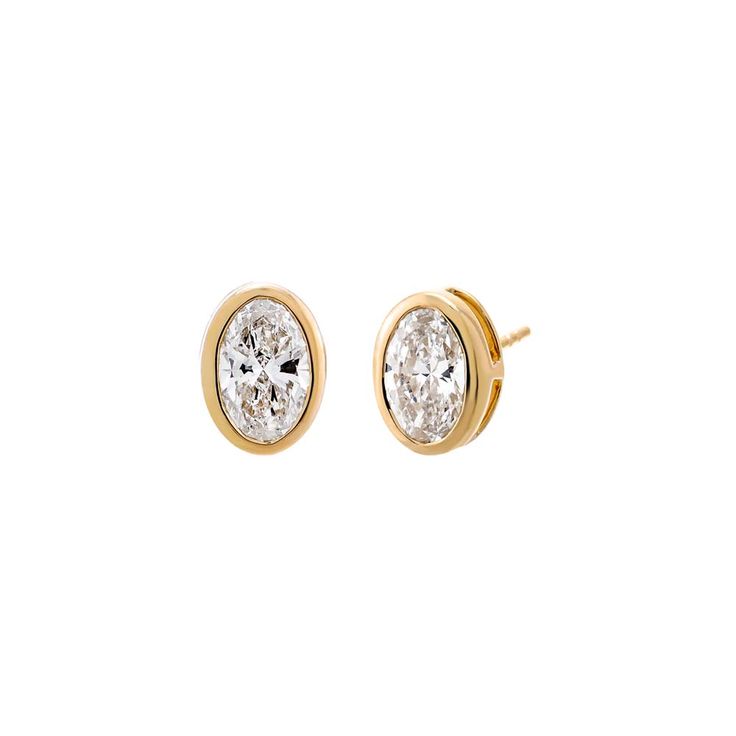 Product Details 14K Gold & 14K White Gold Color: G Clarity: VS1 1 Oval Brilliant-Cut Lab Diamond Available in 5 Carat Sizes: 0.25 CT, 0.5 CT, 1 CT, 1.5 CT & 2 CT Post Backs Sold As A Pair This Item Requires 12-18 Business Days to Be Produced Available For Pre-Order Oval Yellow Gold Brilliant Cut Earrings, Luxury Yellow Gold Oval Diamond Earrings, Oval Yellow Gold Diamond Earrings, Yellow Gold Oval Diamond Earrings For Formal Events, Elegant Oval Earrings With Bezel Setting, Formal Oval Bezel Set Earrings, Formal Oval Earrings With Bezel Setting, Formal Oval Yellow Gold Diamond Earrings, Formal Yellow Gold Oval Diamond Earrings