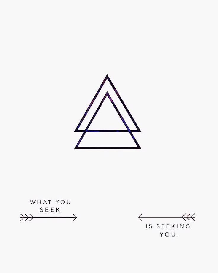 two triangles with the words what you seek is seeing you