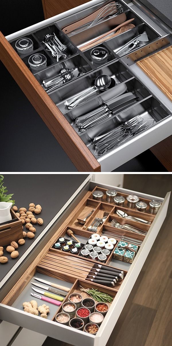 an open drawer is shown with utensils and other kitchen items in the drawers