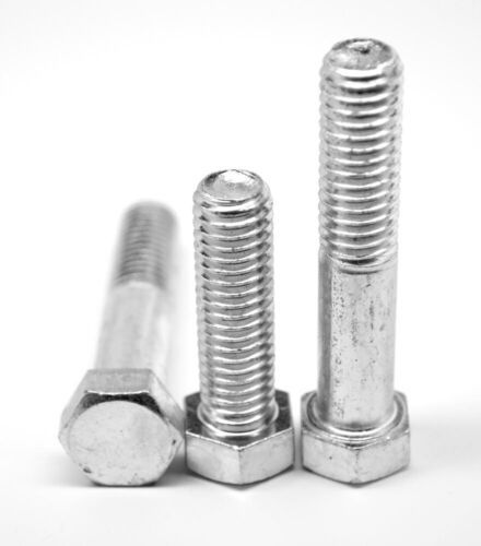 two screws are sitting next to each other on a white surface, with one bolt in the middle