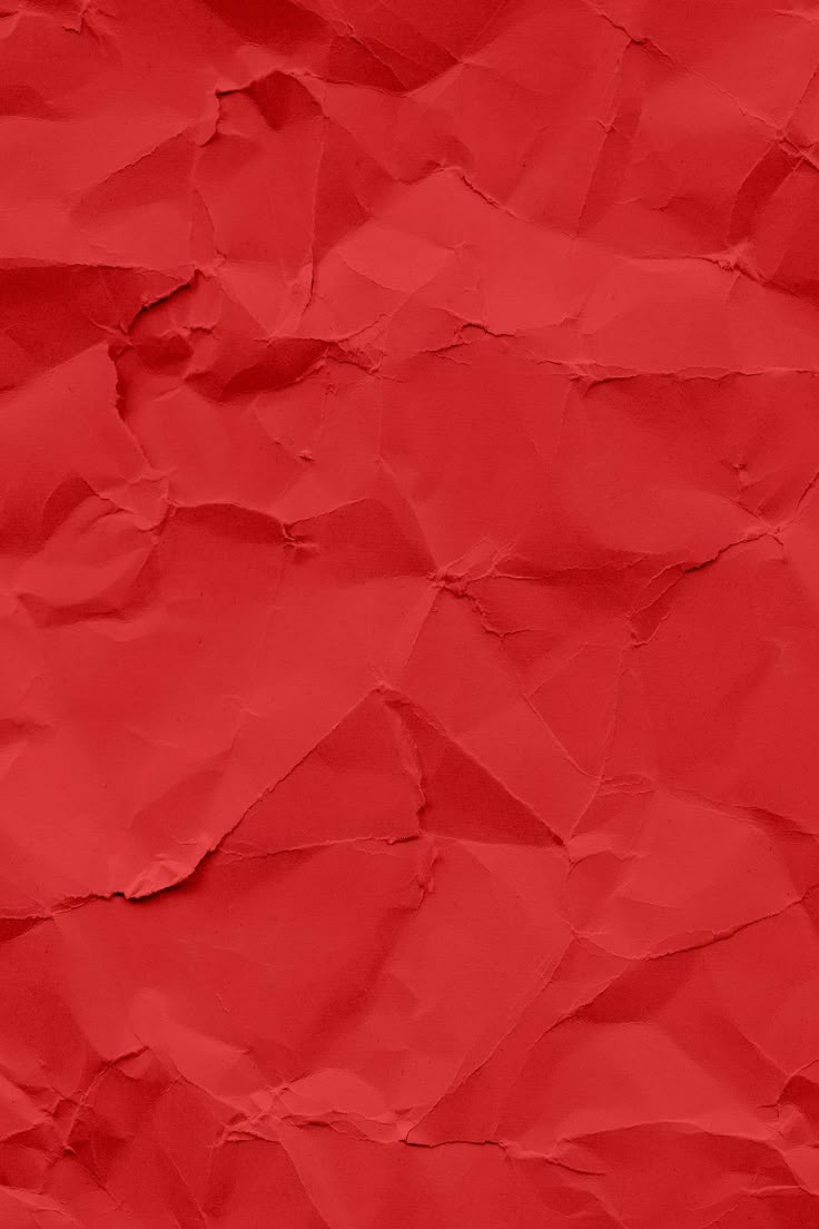 red crumpled paper textured background with space for text