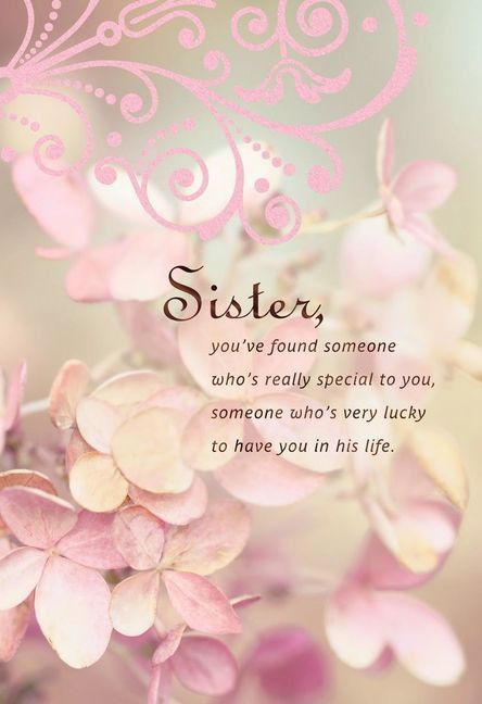 a pink flower with the words sister on it and an image of flowers in the background