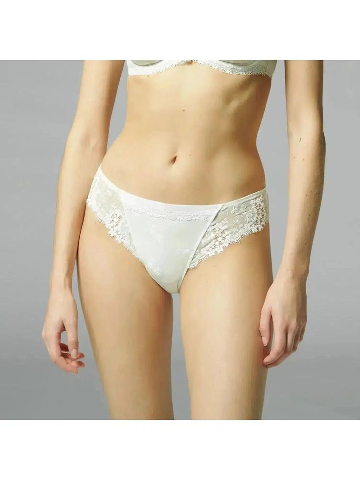 Simone Perele Wish Brief Panty 12B720 in ivory color - front Feminine Sheer Stretch Bottoms, Elegant Stretch Lace Briefs, Delicate Lace Brief Bottoms For Summer, White Brief Bottoms With Contrast Lace, Feminine Lace Stretch Bottoms, Feminine Fitted Bottoms With Contrast Lace, Elegant White Bottoms With Lined Body, Elegant White Lined Bottoms, Elegant Stretch Lace Bottoms