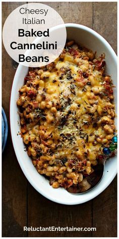 cheesy italian baked cannelli beans in a white bowl