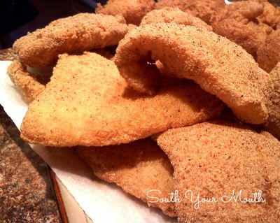 some fried food sitting on top of a piece of paper