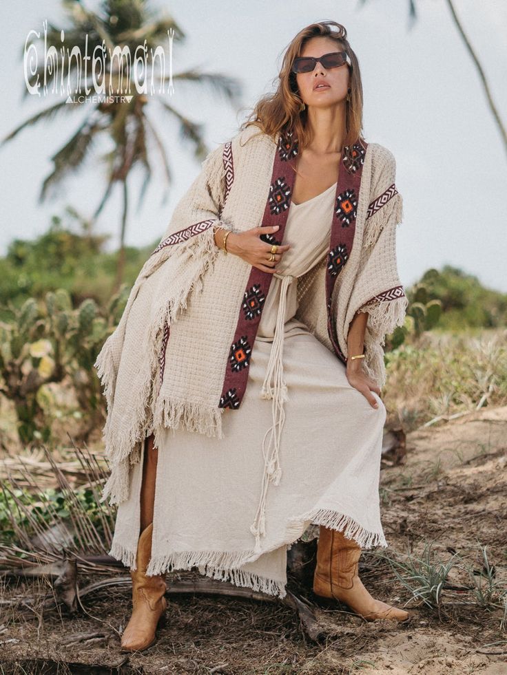 Beige Long Bohemian Kimono, Beige Bohemian Long Kimono, Bohemian Tassel Kaftan For Festivals, Bohemian Kaftan With Tassels For Festivals, Bohemian Tasseled Kaftan For Festivals, Bohemian Beige Poncho For Fall, Beige Bohemian Shawl Poncho, Bohemian Handwoven Poncho For Festival, Bohemian Handwoven Shawl Poncho