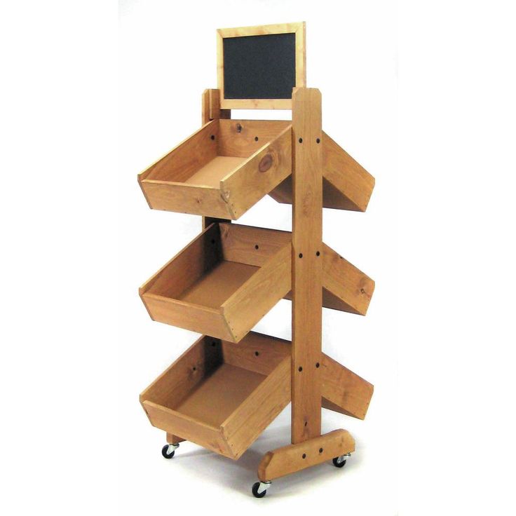 a wooden shelf with chalk board on wheels