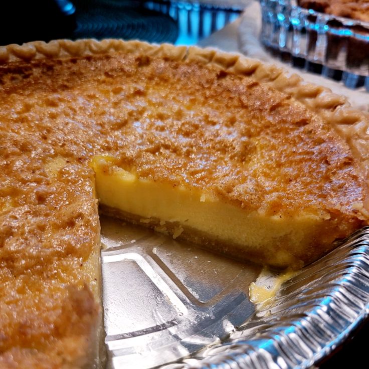 a pie sitting on top of a metal pan