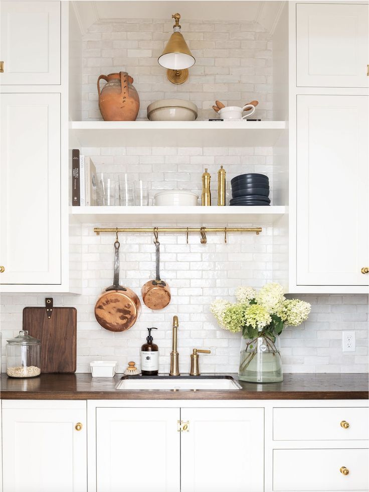 the kitchen is clean and ready to be used as a cook's countertop