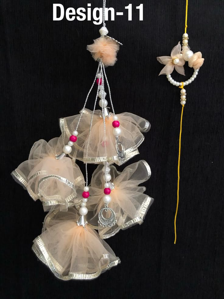 some kind of hanging decoration with flowers and beads