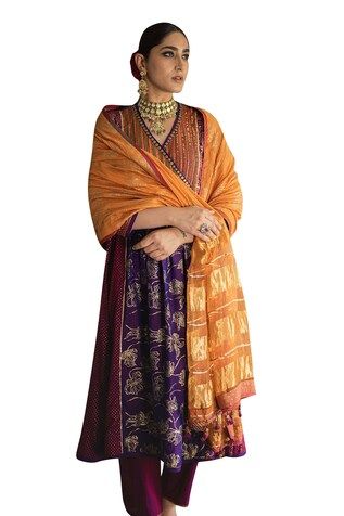 Kesaria orange dupatta with hand block gold foil printed on the border and beaded tassels. - Aza Fashions Multicolor Semi-stitched Dupatta With Latkans, Traditional Orange Anarkali Set With Dupatta, Traditional Orange Anarkali Set With Gota Work, Traditional Orange Dupatta For Designer Wear, Traditional Orange Anarkali Set For Designer Wear, Orange Dupatta For Festive Transitional Season, Bollywood Style Kurta With Dupatta For Rituals, Diwali Kurta With Dupatta For Rituals, Orange Festive Dupatta For Transitional Seasons