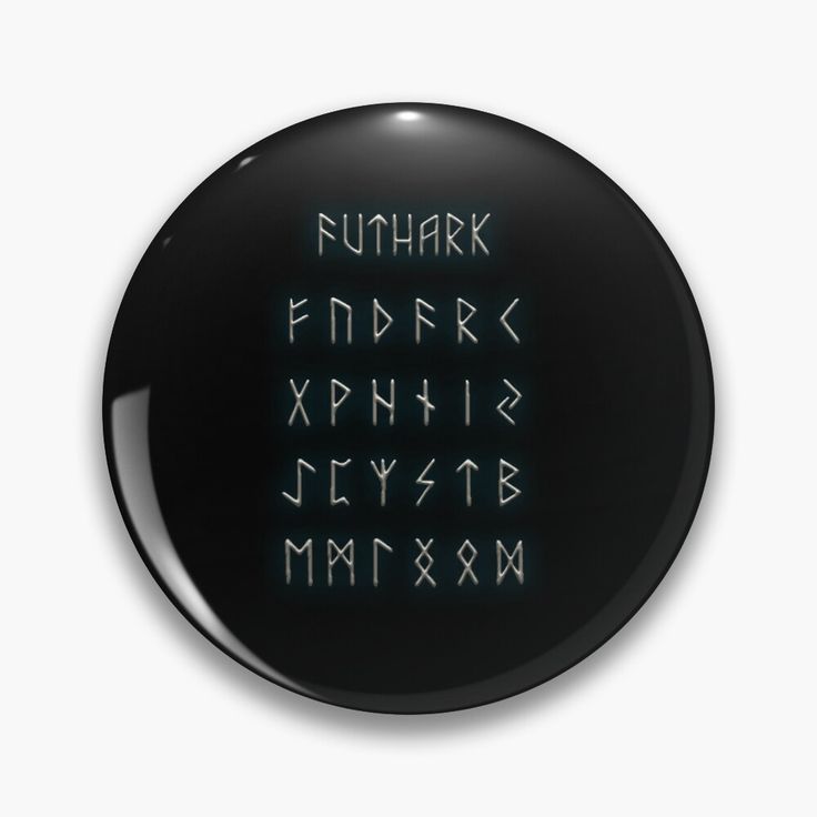 a black button with the letters and numbers in green glow on it's side