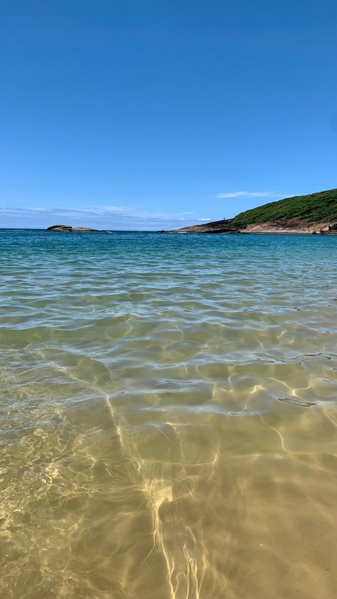 the water is so clear that it appears to be crystal blue and has little ripples in it