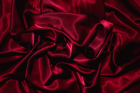 red silk fabric with very soft folds