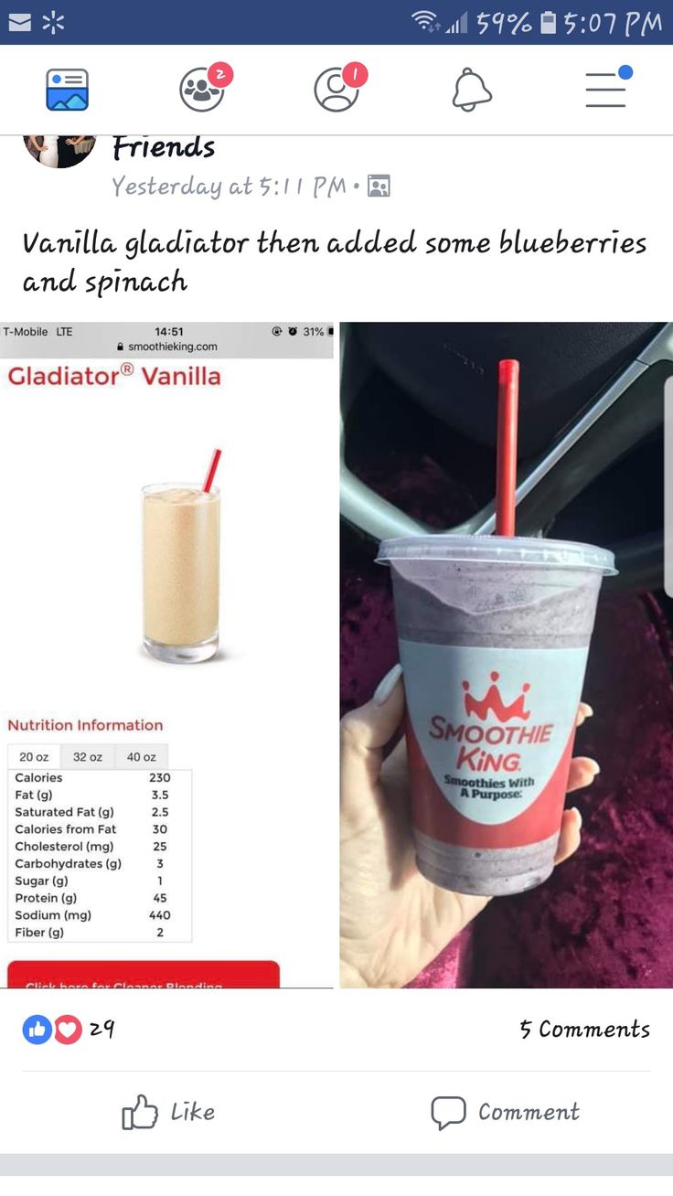 an image of a person holding up a drink in front of a facebook page with the caption'vanilla gloatour then added some blueberries and spinach