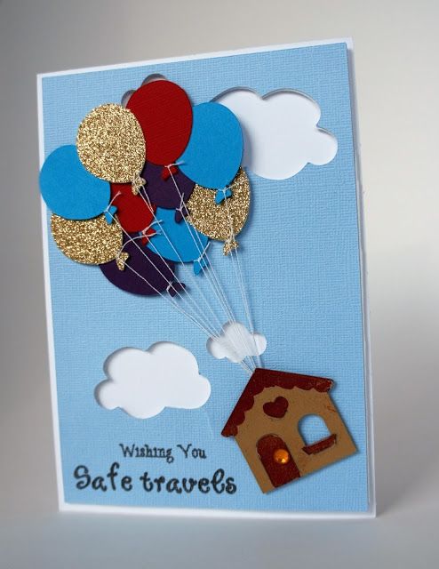 a greeting card with balloons and a dog house