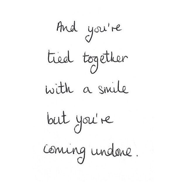 a handwritten quote with the words and you're tied together with a smile but you're coming undone