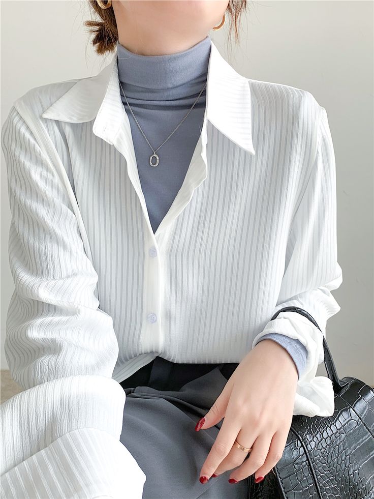 Take charge of your style and create the look you desire with our Vertical Striped Silky Blouse. This versatile blouse offers a slim-fit, making it your go-to piece for an array of fashion-forward outfits. Featuring long sleeves, a classic collar, and a subtle vertical striped pattern, this blouse pairs well over your solid tees and turtlenecks or shines as a stand-alone piece tucked into your favorite trousers. Full Sleeve Top Outfits, Blouse With Jeans Outfit, Long Blouse Outfit, Long Sleeve Blouse Outfit, Collar Blouse Outfit, Cute Professional Outfits, Match Outfits, Full Sleeve Top, Fashion Forward Outfits