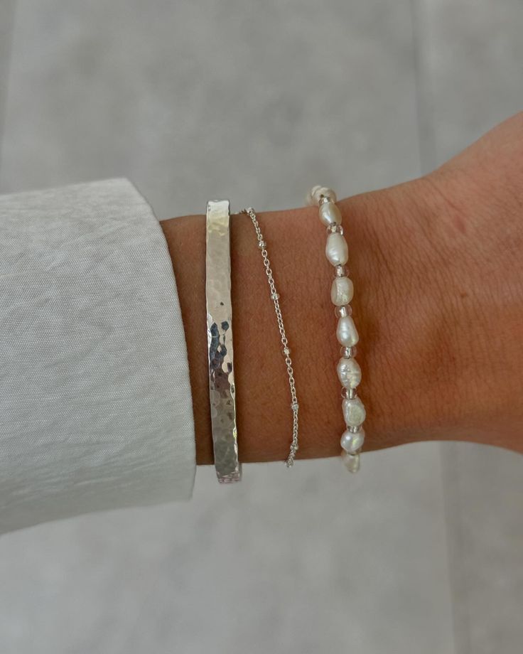 Beaded bracelets and necklaces are now available 💚 Add some colour to your wrist stack this summer ☀️ Choose from Pearl, blue or red 💫 #summerstyling #summerjewellery #beadedbracelets #wriststack #handmadejewellery #silverjewellery #silverbracelet Classy Silver Bracelets, Dainty Silver Bracelet Stack, Silver Wrist Stack, Trendy Silver Bracelets, Bracelet Stacks Silver, Beaded Bracelets With Words, Jewelry Inspo Silver, Silver Necklace Stack, Silver Jewelry Stack