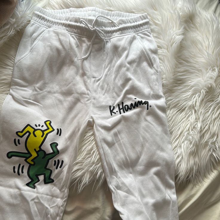 Keith Haring White Designed Sweatpants 240119bk Spring Athleisure Bottoms With Graphic Print, Yellow Athleisure Pants For Streetwear, Streetwear Yellow Pants With Elastic Waistband, Yellow Pants With Elastic Waistband For Streetwear, White Fitted Casual Joggers, Yellow Casual Sweatpants For Spring, Casual Yellow Sweatpants For Spring, Yellow Athleisure Bottoms For Streetwear, Yellow Casual Spring Sweatpants