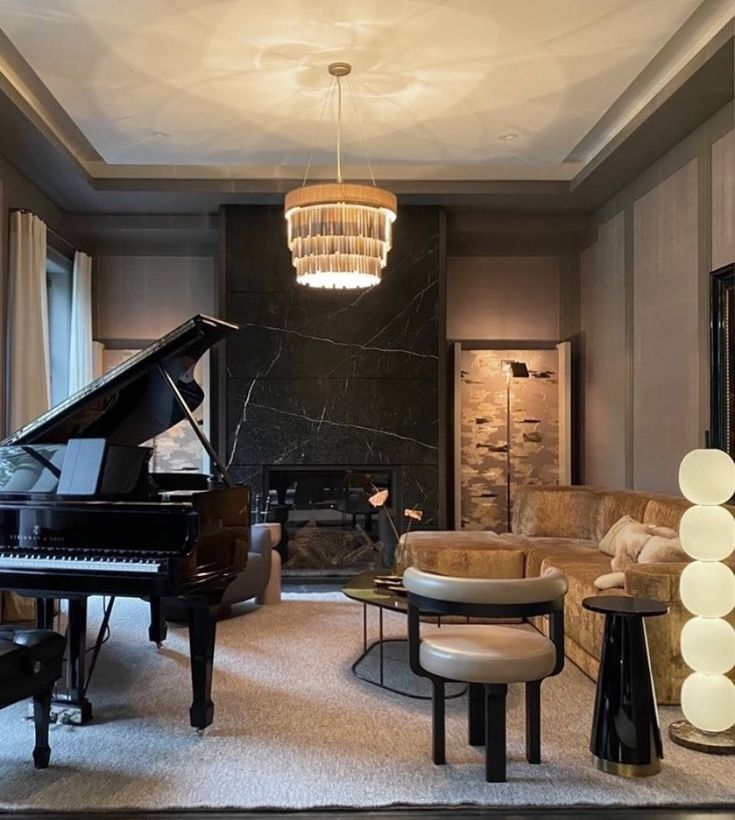 a living room filled with furniture and a grand piano