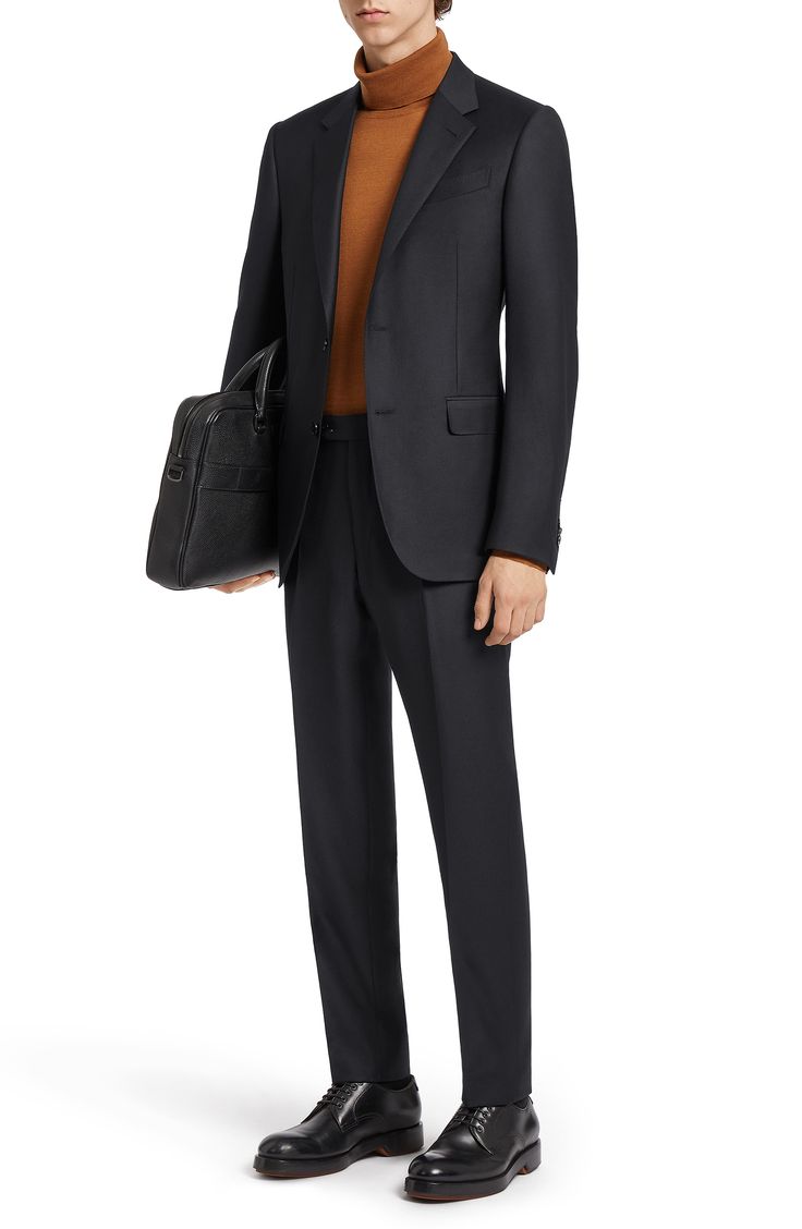 Crafted from the brand's signature Trofeo wool, this suit features an impeccable fit and modern polish for a subtly sophisticated look and daylong comfort. Jacket has notched lapels; nonfunctional four-button cuffs; chest pocket; flap pockets; side vents Trousers have zip fly with button-tab closure; front slant pockets; back button-welt pockets Jacket is lined; trousers are lined to the knee 100% wool Dry clean Made in Turkey Men's Designer Clothing Zegna Suits Men, Modern Business Casual Suit With Pressed Crease, Luxury Tailored Suits With Concealed Placket, Luxury Tailored Suit With Hidden Button Closure, Luxury Wool Suits With Notch Lapel, Wool Suits With Concealed Placket For Business Casual, Luxury Single Breasted Suit For Business Casual, Luxury Wool Three-piece Suit With Notch Lapel, Luxury Single-breasted Business Casual Suit