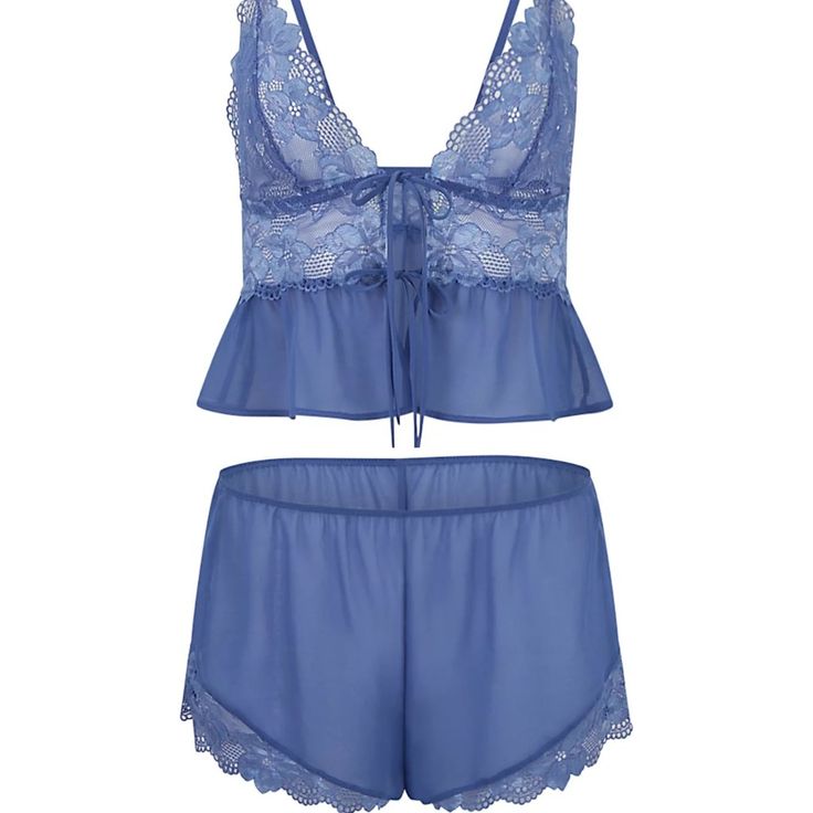 Never Been Worn Or Tried On - Received A Duplicate Gift. I Love The Set I Own, Though! This Romantic Dark Blue Camisole And Short Set Will Make You Feel Like Royalty. The Lace And Chiffon Fabrics Give This Lingerie Set A Luxurious Feel, While The Flyaway Front And Functional Ties Add A Hint Of Playfulness. The Unlined Triangle Cups And Adjustable Straps Provide Support And Comfort For All Sizes. Chiffon: 100% Recycled Polyester Lace: Polyamide/ Polyester/ Elastane Elastic Waistband Amparo Blue / Blue Summer Night Sets, Blue Sleeveless Lace Sleepwear, Blue Lace Sleeveless Sleepwear, Blue Spaghetti Strap Camisole For Pajama Party, Blue Sleeveless Camisole For Pajama Party, Blue Summer Camisole For Night Wear, Blue Camisole For Summer Nights, Blue Summer Night Camisole, Blue Cami Sleepwear For Lounging