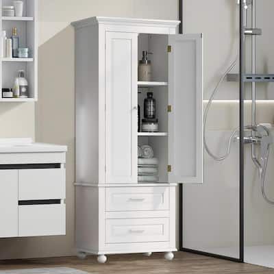 a bathroom with a white cabinet, sink and shower stall in it's corner