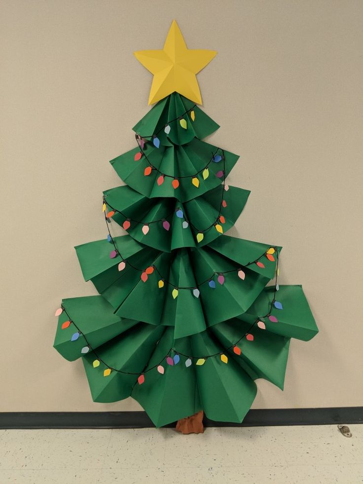 a christmas tree made out of folded paper