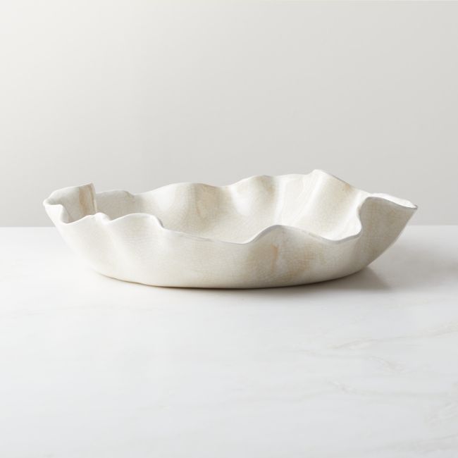 a white bowl sitting on top of a table