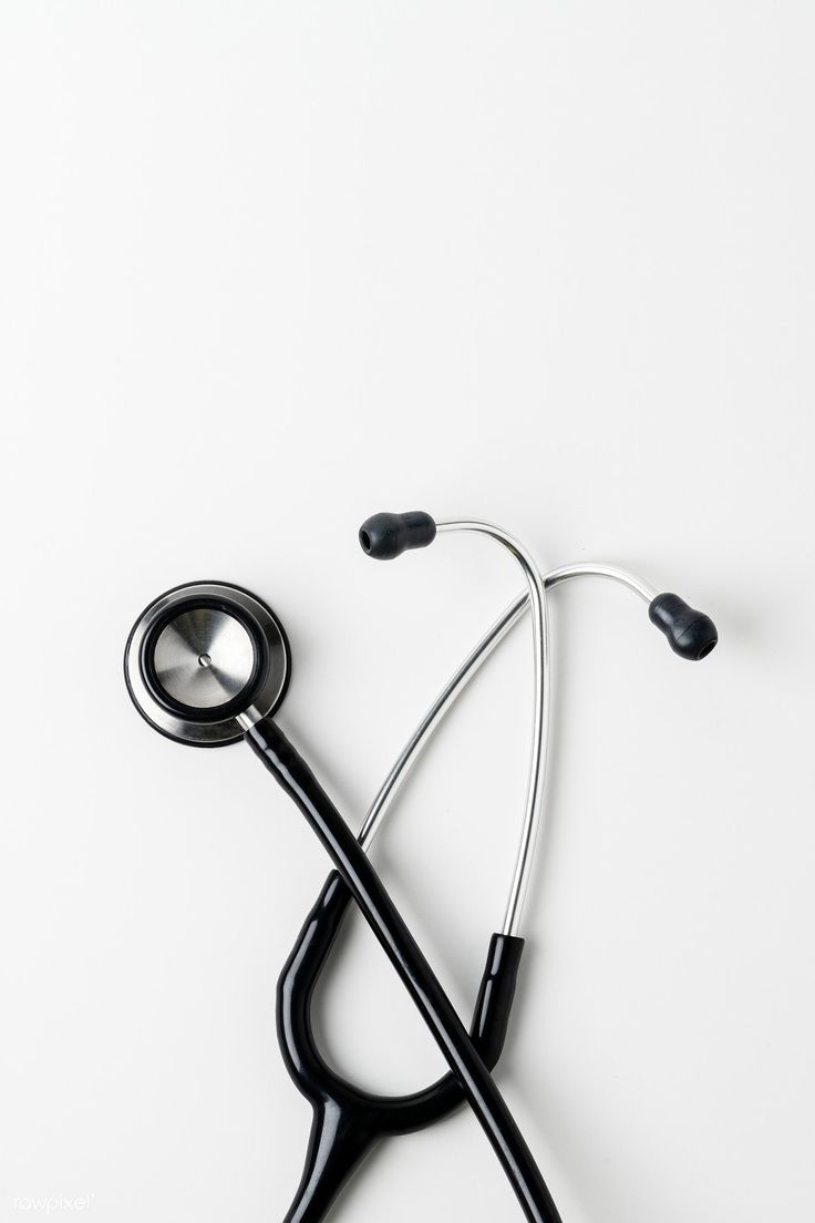 a stethoscope laying on top of a white surface